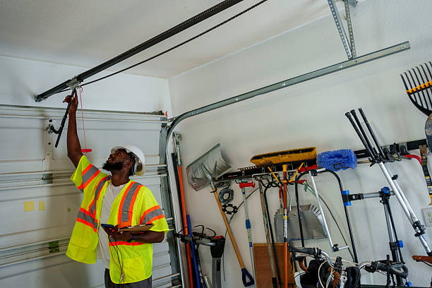Professional Garage Door Panel Replacement technician working in Elmo, TX